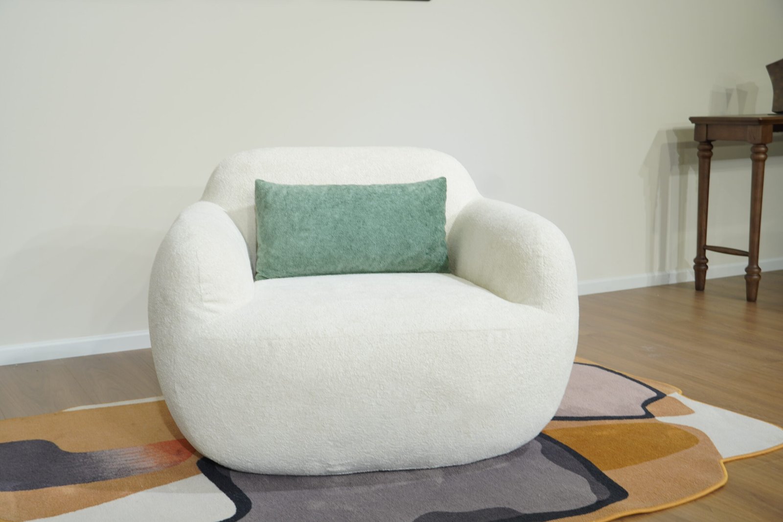 Nestory Sofa modern white curved lounge chair three quarter view